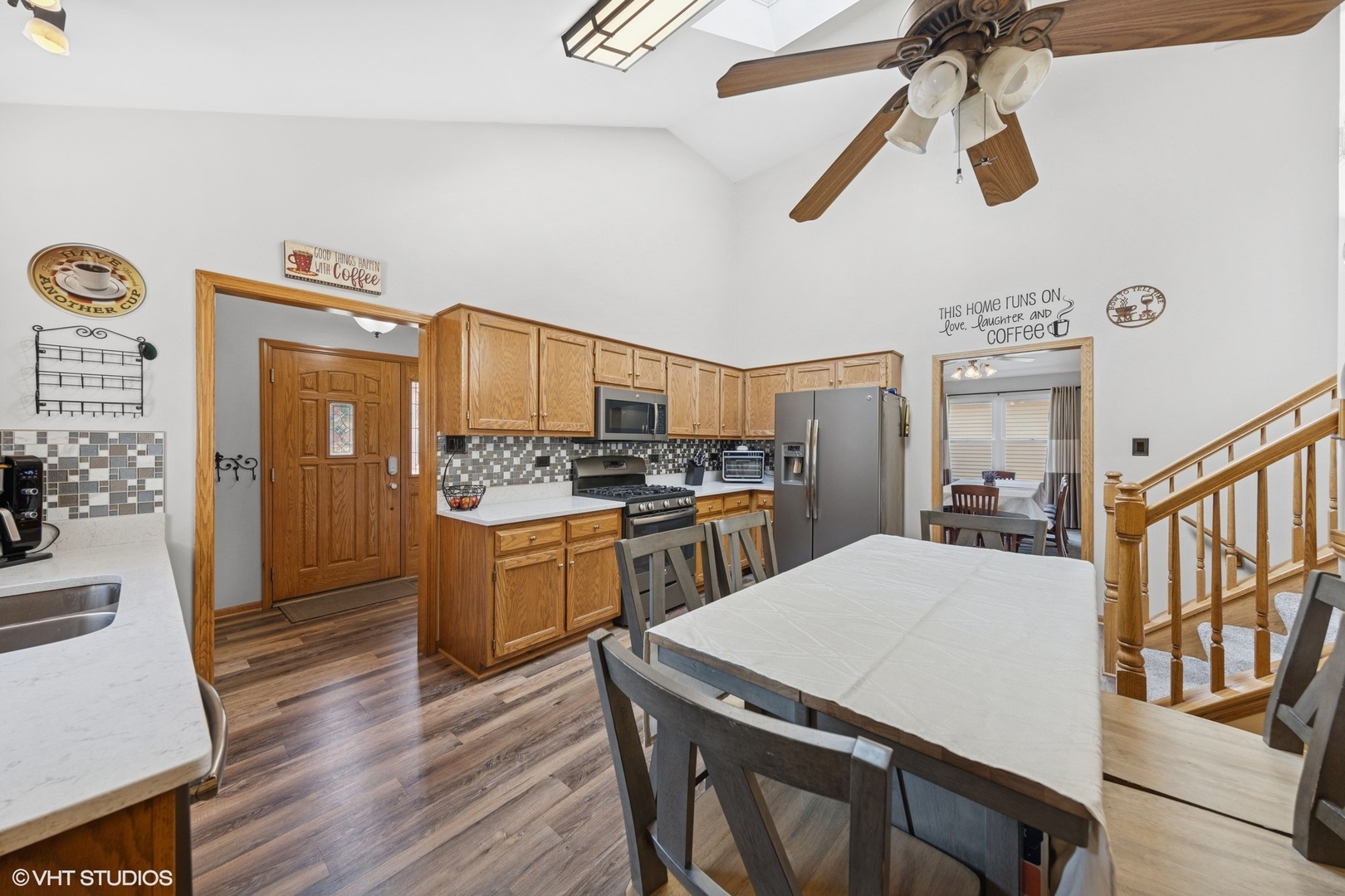 1908 Chestnut Hill Road Plainfield, IL 60586 - Photo 8 of 30 a kitchen with a table and chairs