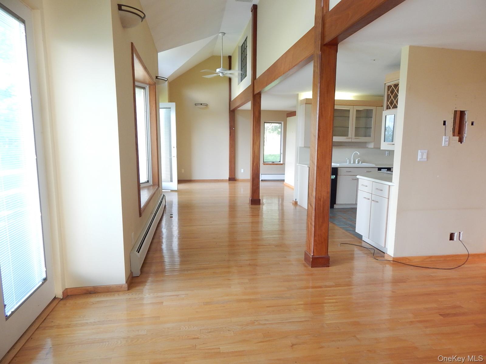 5 Eagle Head Road Cornwall-on-Hudson, NY 12520 - Photo 24 of 24 a view of a hallway with wooden floor and a bathroom