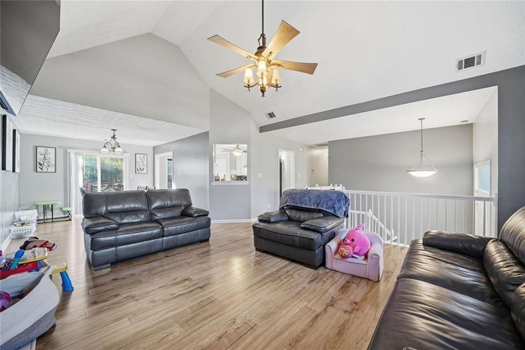 147 Midland Drive Stockbridge, GA 30281 - Photo 2 of 30 a living room with furniture and wooden floor
