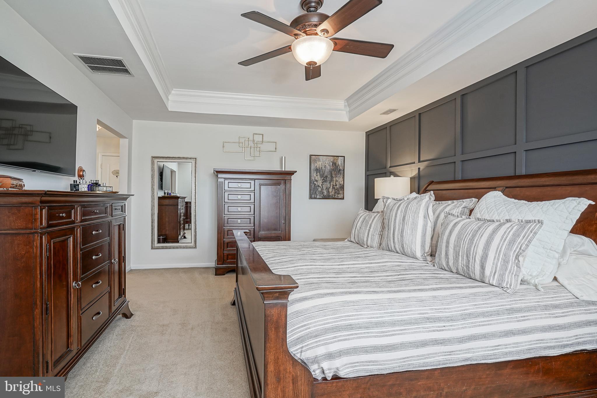 804 Chelsea Glenn Road Clarksboro, NJ 08020 - Photo 25 of 58 a bedroom with a large bed and a flat tv screen on dresser
