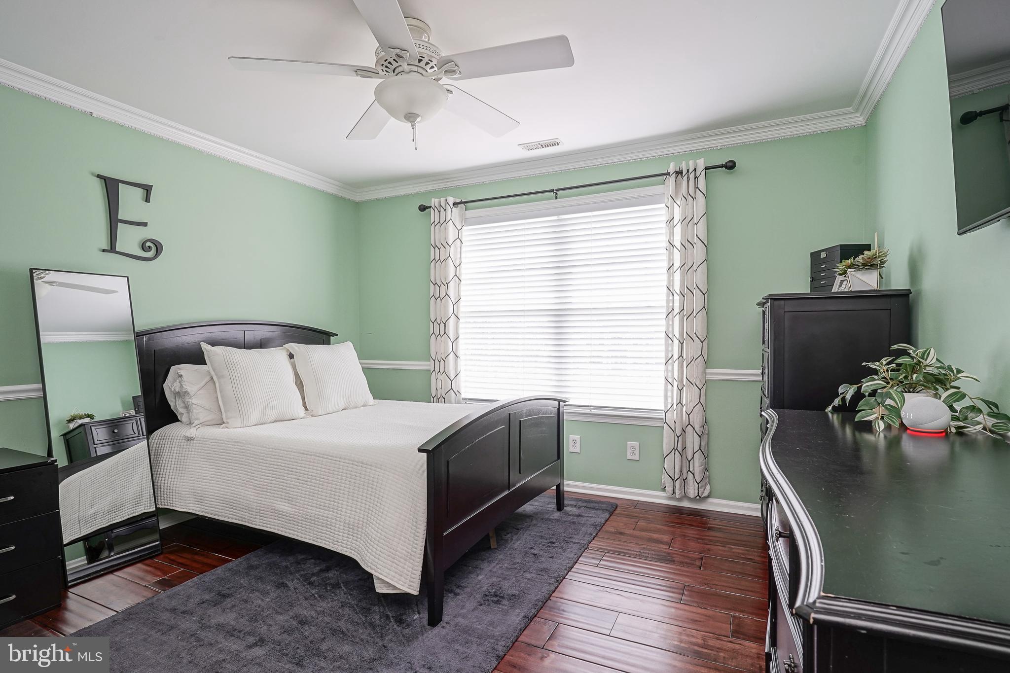 804 Chelsea Glenn Road Clarksboro, NJ 08020 - Photo 30 of 58 a bedroom with a bed flowerpot and window