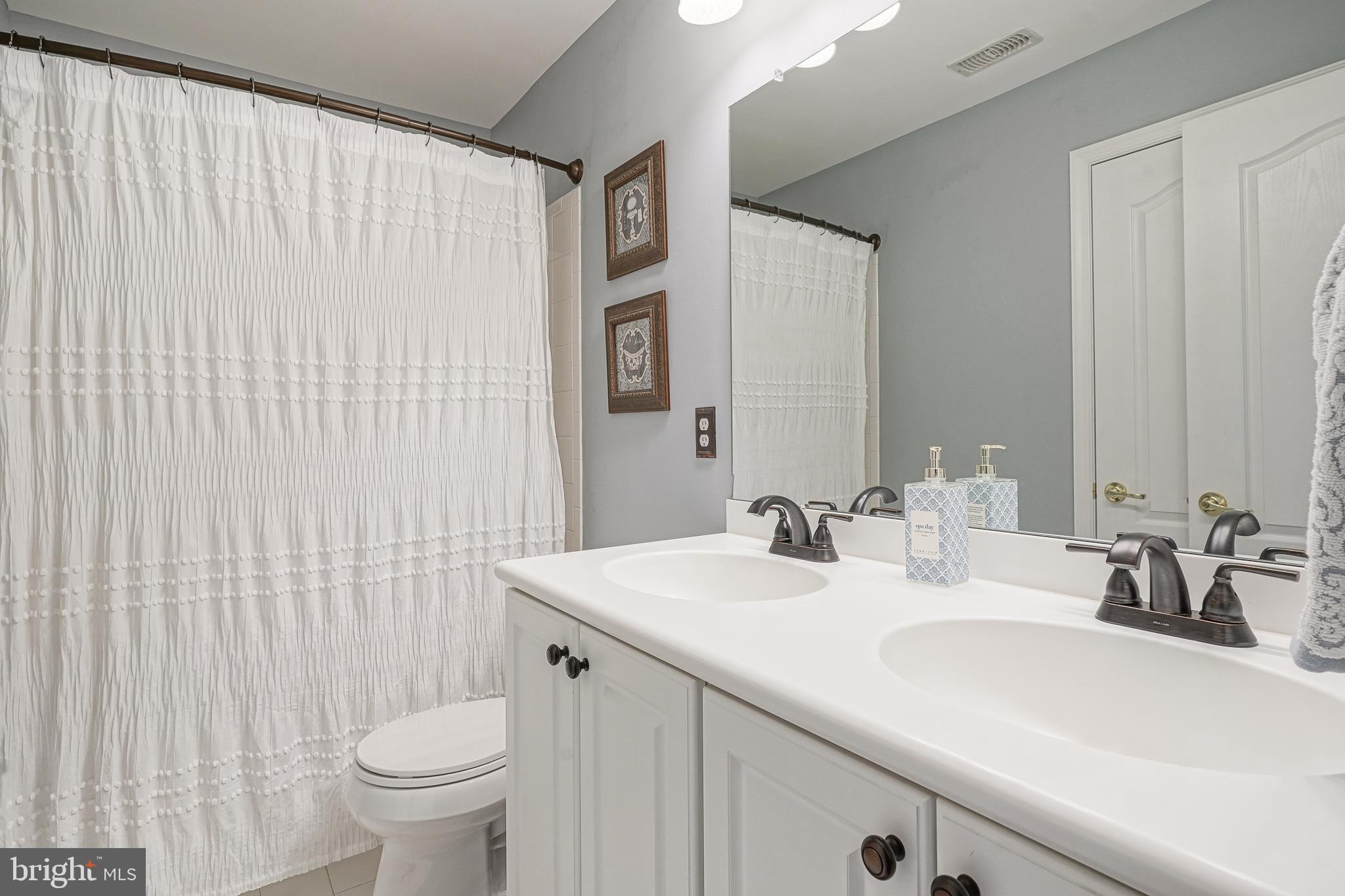 804 Chelsea Glenn Road Clarksboro, NJ 08020 - Photo 36 of 58 a bathroom with a sink and a mirror
