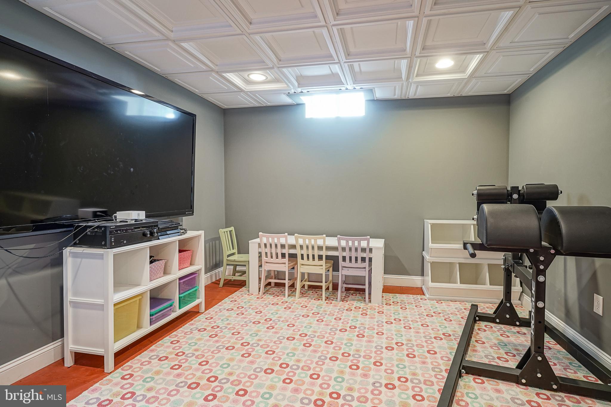 804 Chelsea Glenn Road Clarksboro, NJ 08020 - Photo 47 of 58 a room with furniture a flat screen tv and gym equipment