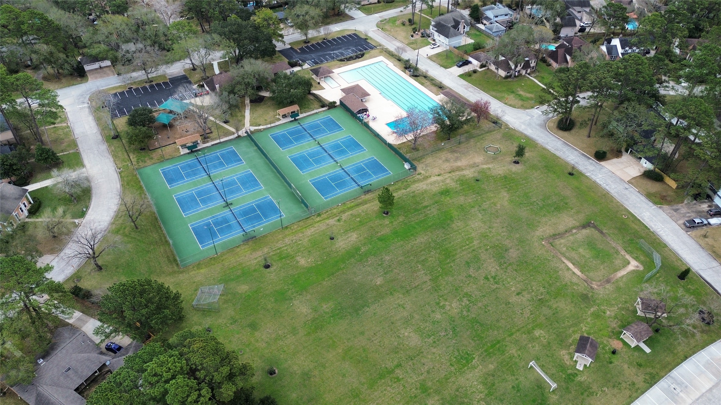 6511 Castle Pine Lane Spring, TX 77379 - Photo 39 of 49 Expansive green space offers plenty of room for outdoor fun, including soccer goals, open play areas, and recreational activities for all ages.