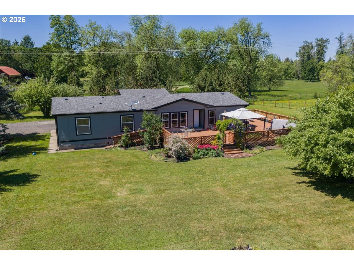 35377 Ede Road Lebanon, OR 97355 - Photo 34 of 48 a front view of a house with garden