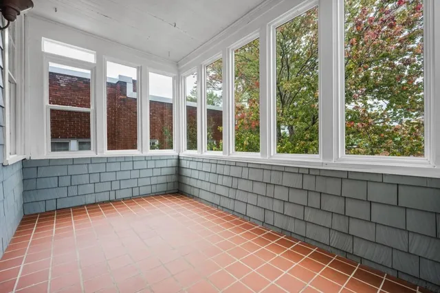 a view of a brick house with a window