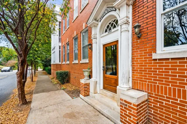 a front view of a multi story residential apartment buildings
