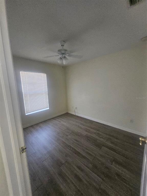 7450 Blutter Road North Port, FL 34291 - Photo 14 of 20 a view of an empty room with a window
