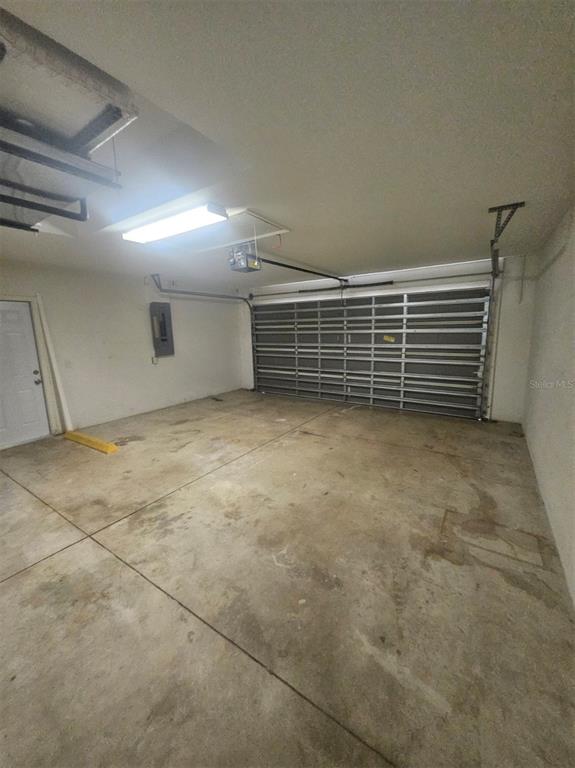 7450 Blutter Road North Port, FL 34291 - Photo 19 of 20 a view of an empty room with windows