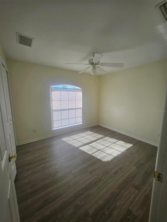 7450 Blutter Road North Port, FL 34291 - Photo 20 of 34 a view of empty room with window and chandelier fan