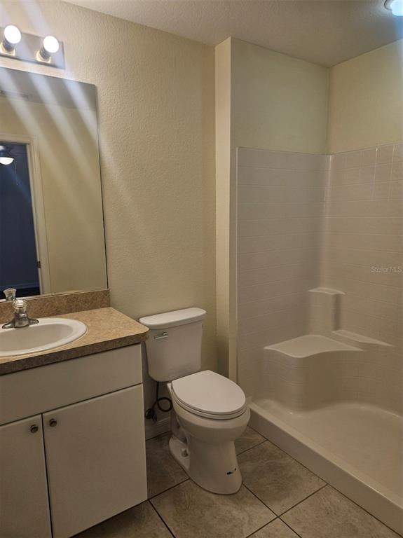 7450 Blutter Road North Port, FL 34291 - Photo 27 of 34 a bathroom with a sink a toilet and shower