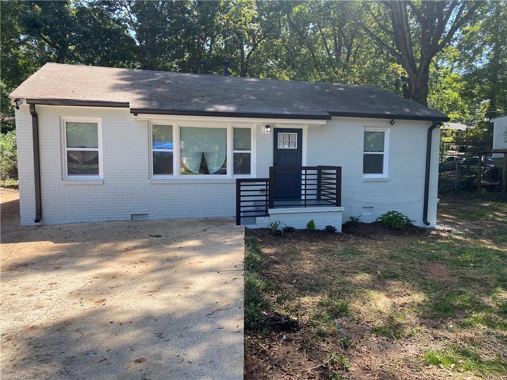 4173 Sherwood Avenue Decatur, GA 30035 - Photo 1 of 1 a view of a house with a yard