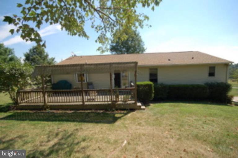 14143 Taylorstown Road Leesburg, VA 20176 - Photo 3 of 15 a view of a house with backyard and porch
