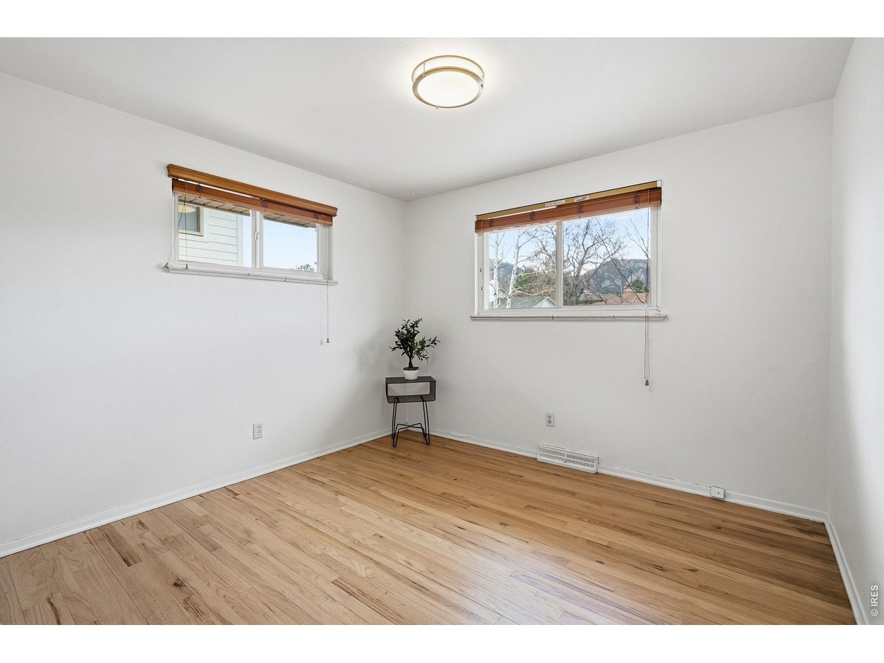 130 Cherokee Way Boulder, CO 80303 - Photo 14 of 25 a view of empty room with wooden floor