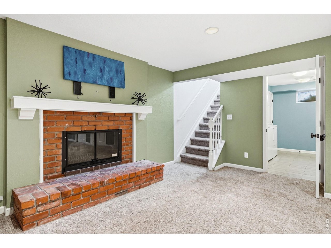 130 Cherokee Way Boulder, CO 80303 - Photo 18 of 25 a view of an empty room with fire place and a fireplace