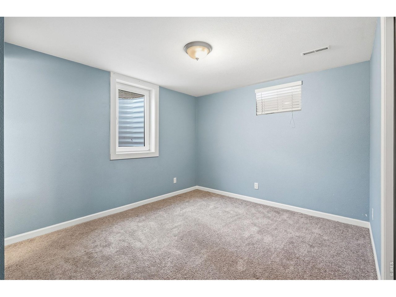 130 Cherokee Way Boulder, CO 80303 - Photo 19 of 25 a view of an empty room with a window