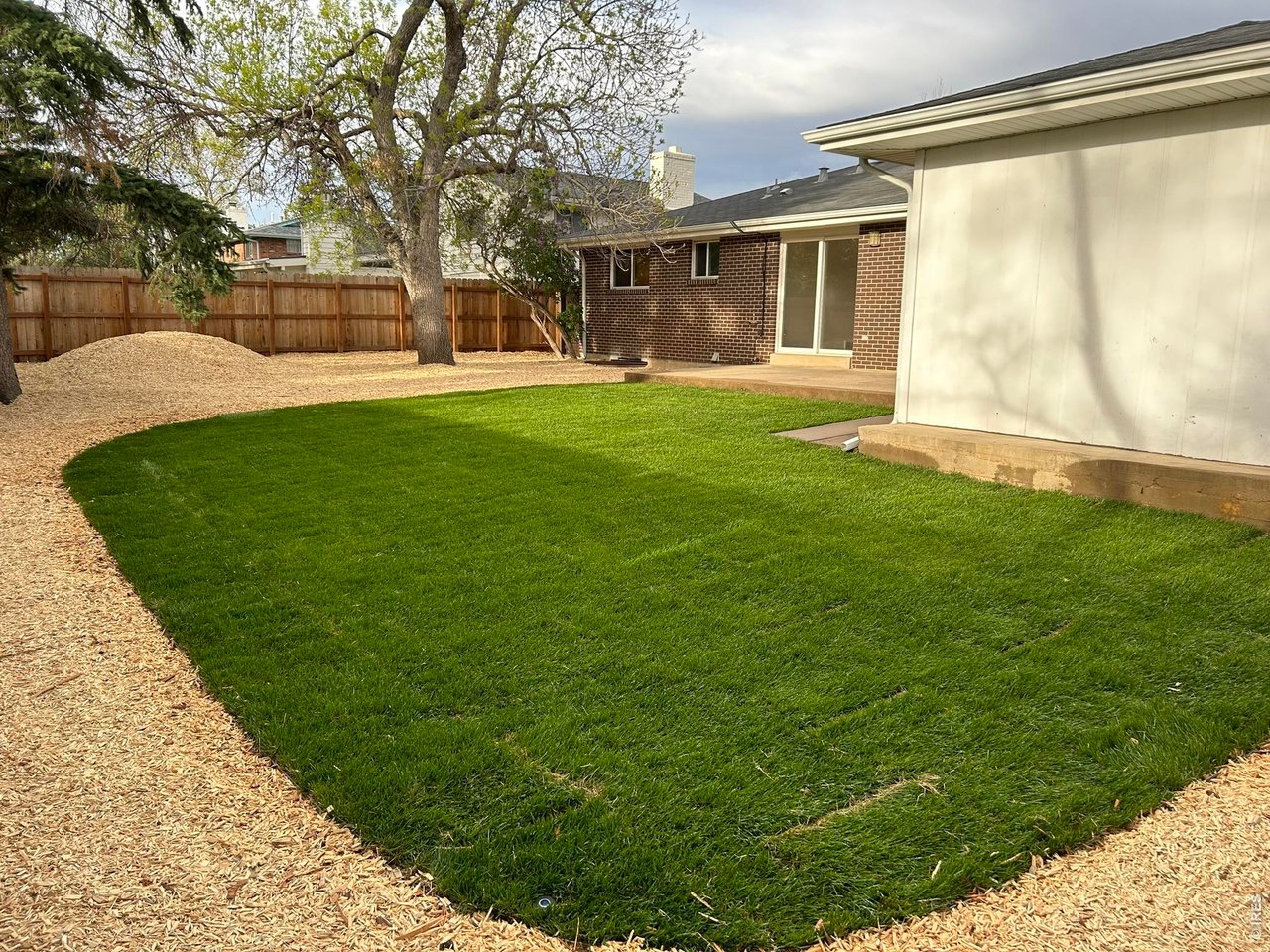 130 Cherokee Way Boulder, CO 80303 - Photo 24 of 25 a front view of house with yard and green space
