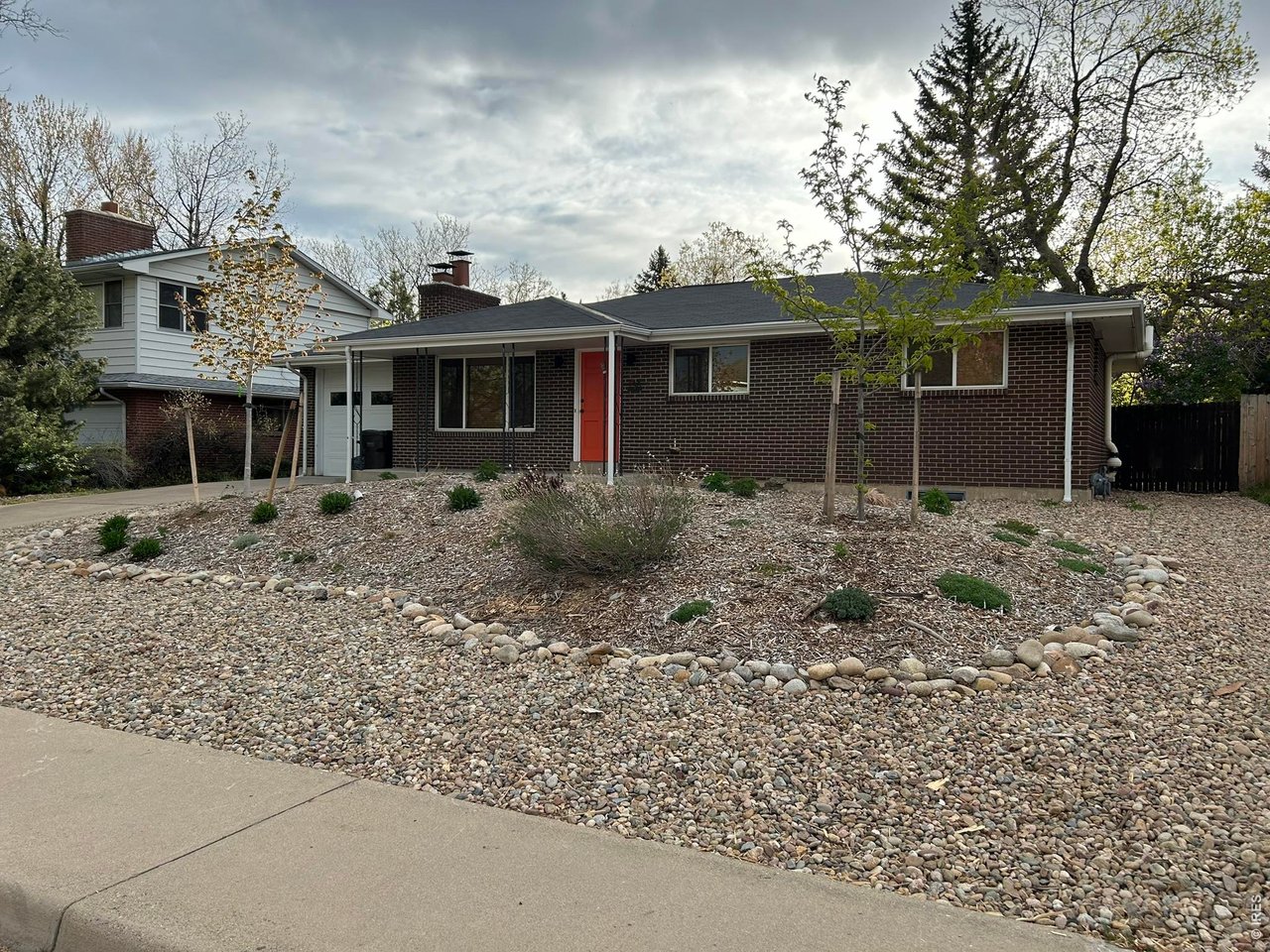 130 Cherokee Way Boulder, CO 80303 - Photo 3 of 25 a view of a house with a yard