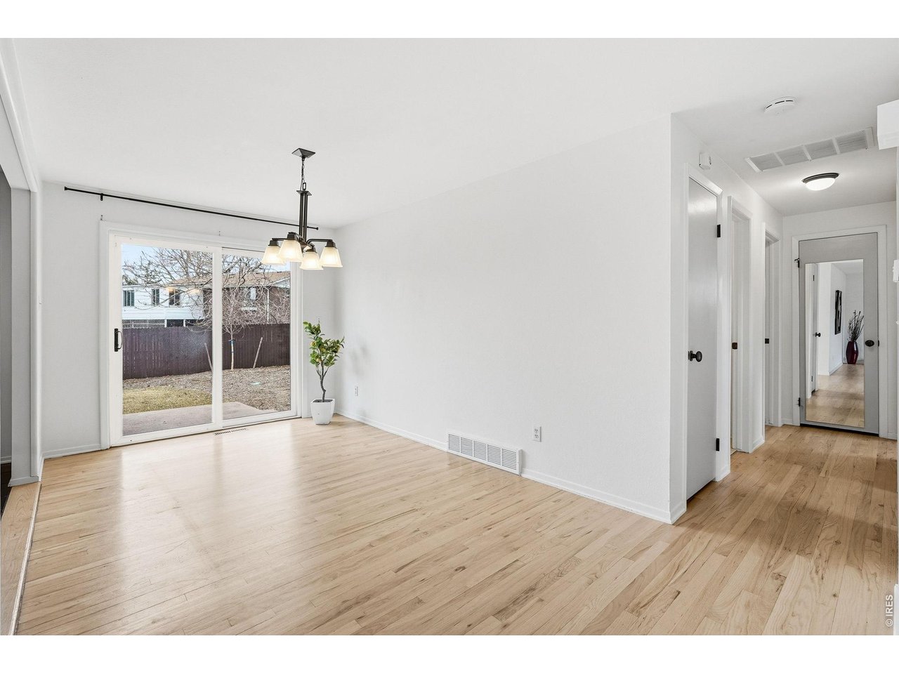 130 Cherokee Way Boulder, CO 80303 - Photo 25 of 25 a view of an empty room with wooden floor