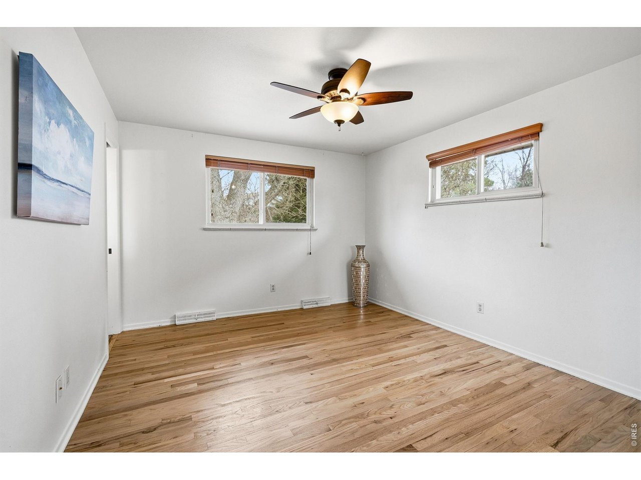 130 Cherokee Way Boulder, CO 80303 - Photo 9 of 25 a view of an empty room with a window