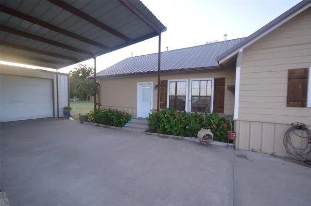 a view of a house with a patio