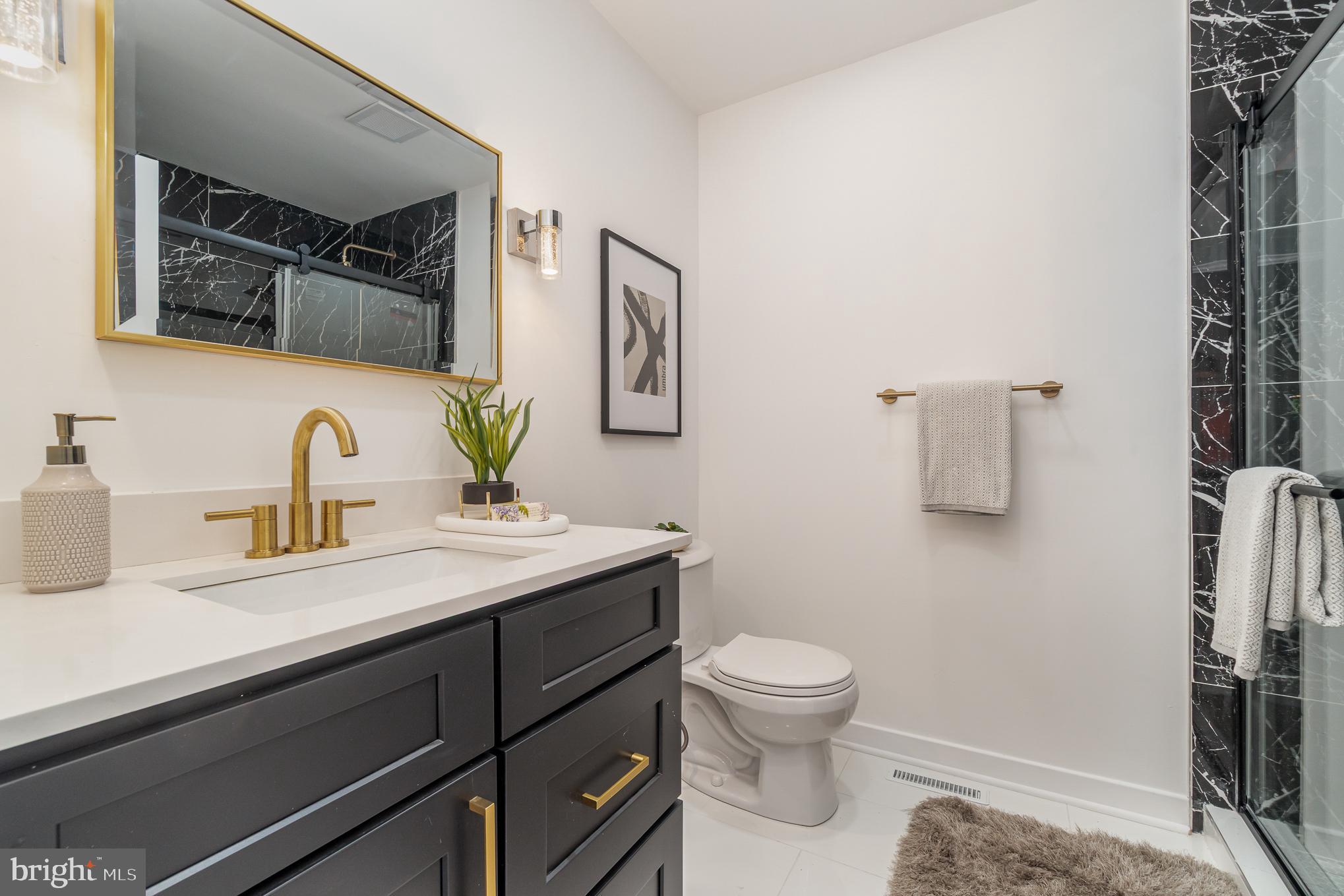 555 Hilltop Road Hummelstown, PA 17036 - Photo 12 of 56 a bathroom with a sink toilet and shower