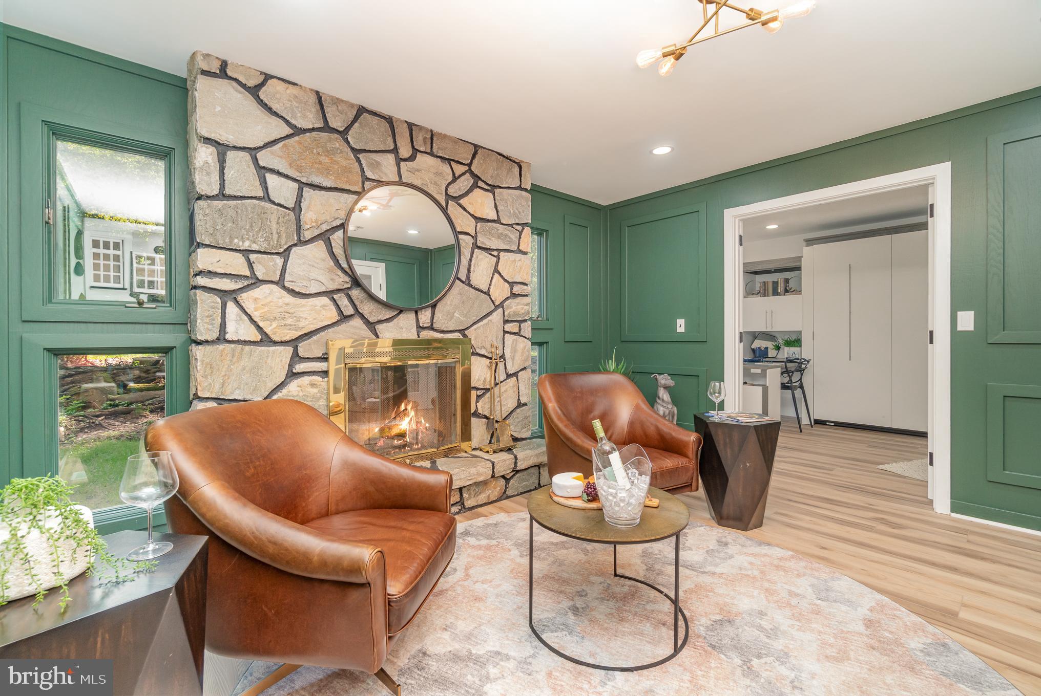 555 Hilltop Road Hummelstown, PA 17036 - Photo 15 of 56 a living room with furniture a mirror and a wooden floor