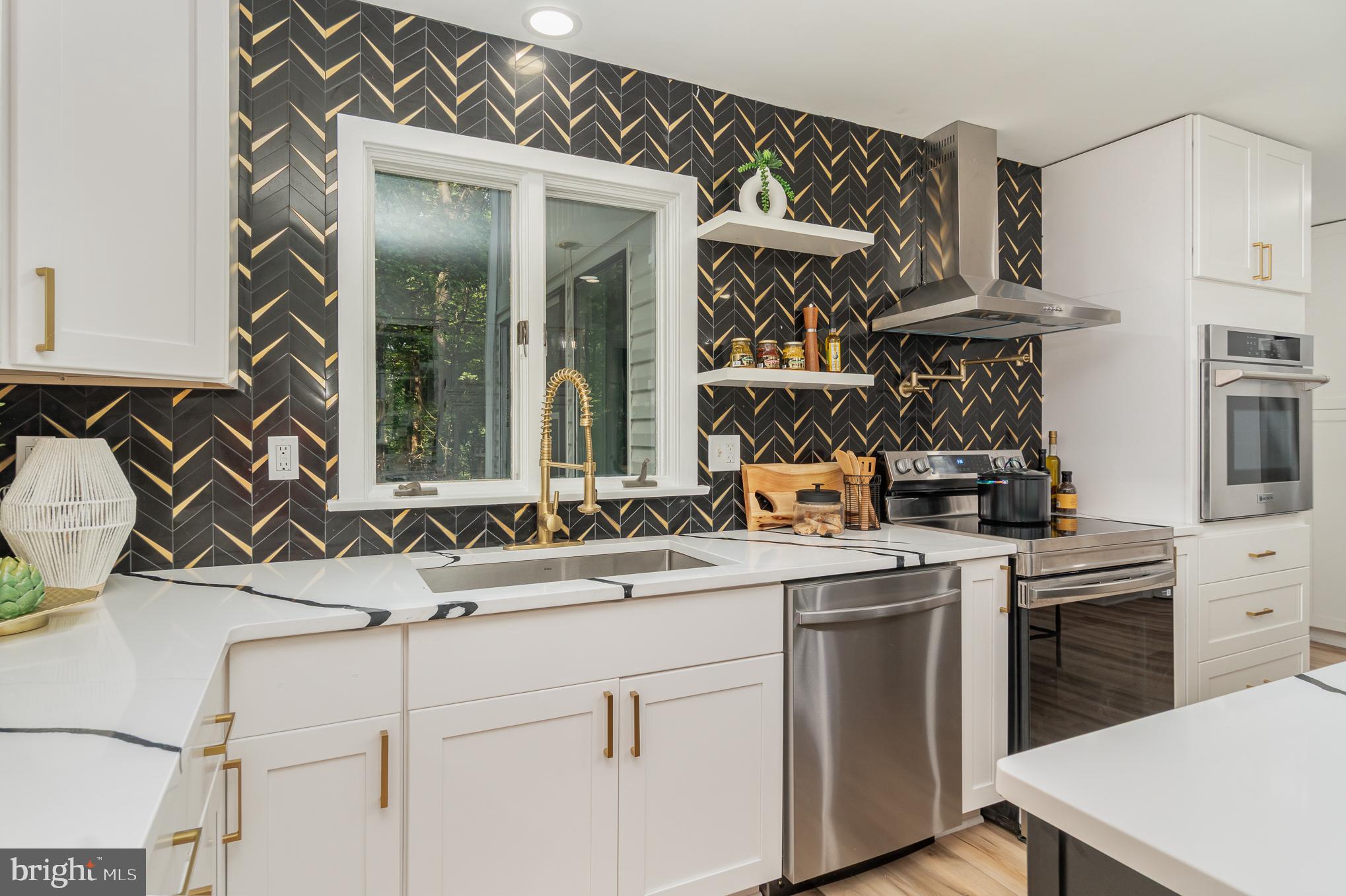 555 Hilltop Road Hummelstown, PA 17036 - Photo 18 of 56 a kitchen with a sink and cabinets