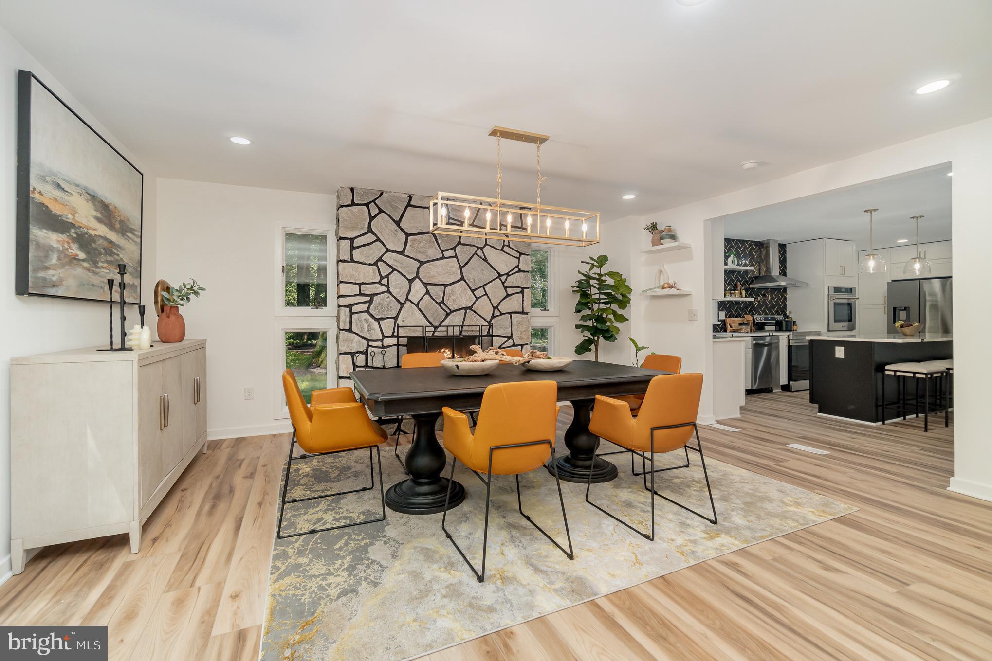 555 Hilltop Road Hummelstown, PA 17036 - Photo 23 of 56 a view of a dining room with furniture and wooden floor