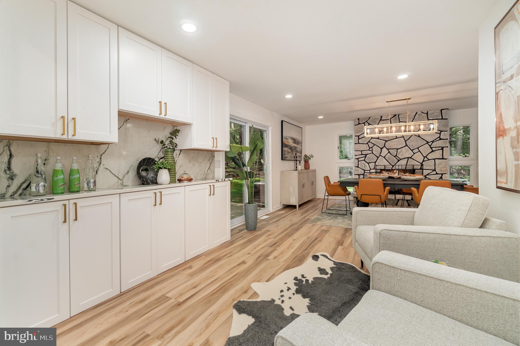 555 Hilltop Road Hummelstown, PA 17036 - Photo 25 of 56 a living room with furniture or kitchen and a wooden floor