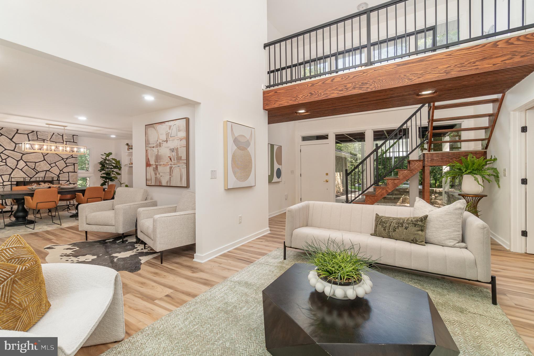 555 Hilltop Road Hummelstown, PA 17036 - Photo 26 of 56 a living room with furniture ceiling fan and a rug
