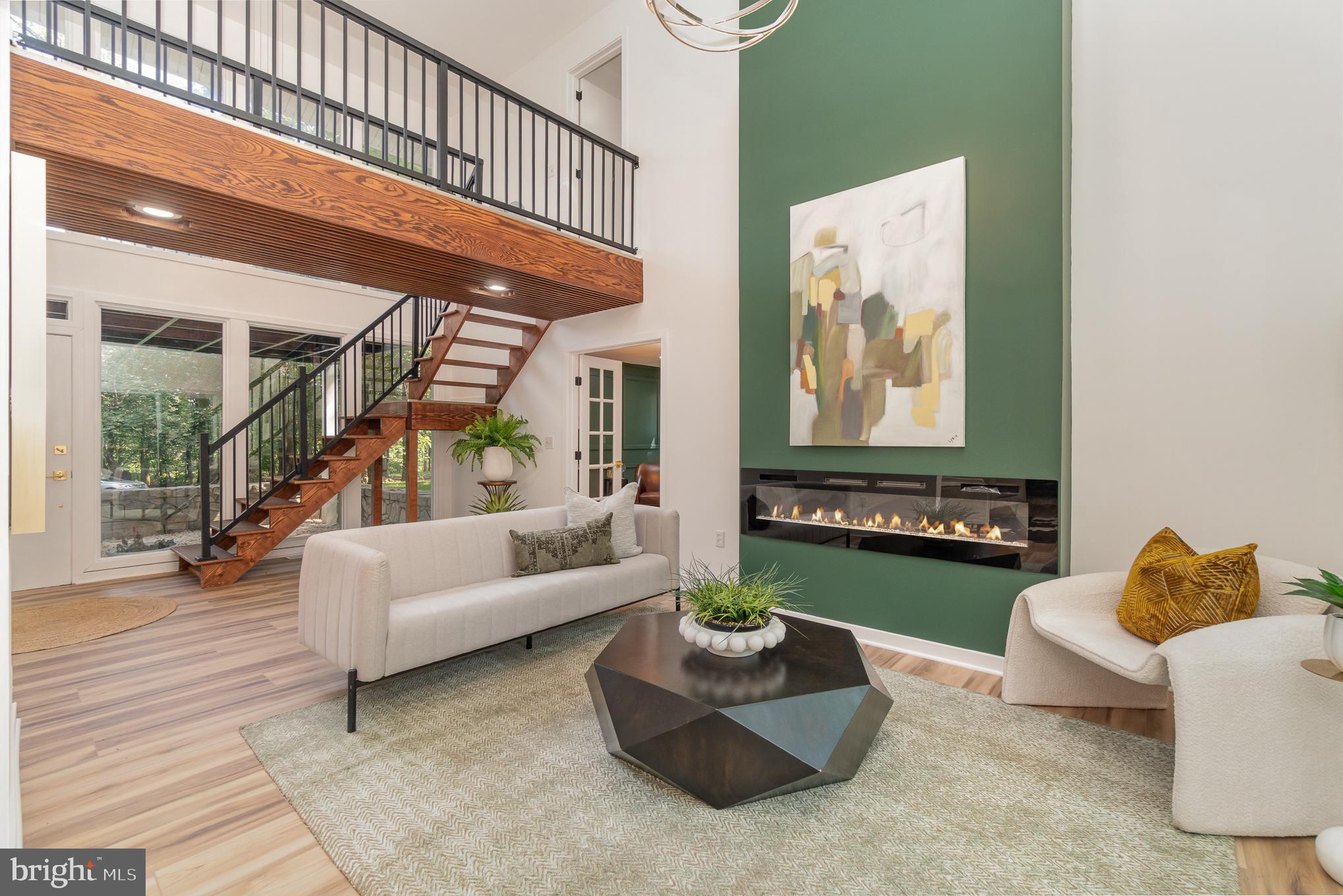 555 Hilltop Road Hummelstown, PA 17036 - Photo 27 of 56 a living room with furniture and a large window