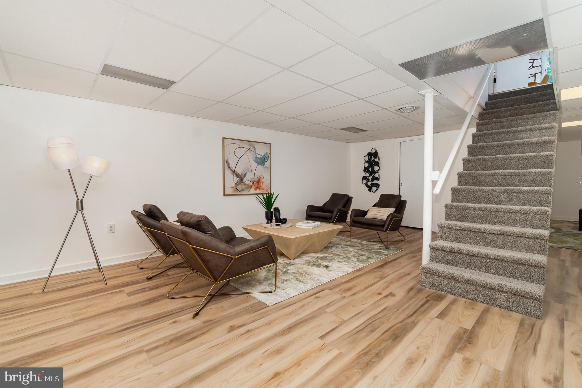 555 Hilltop Road Hummelstown, PA 17036 - Photo 30 of 56 a living room with furniture and wooden floor