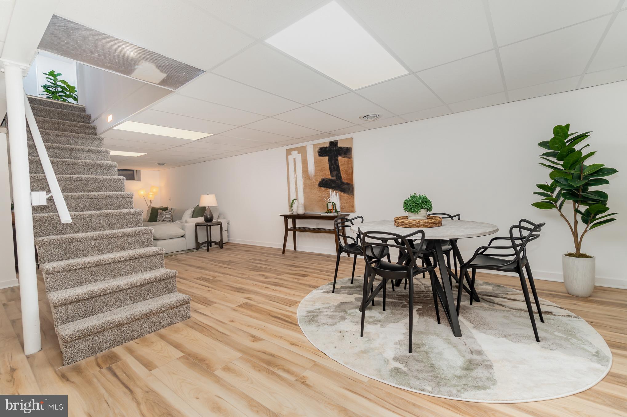 555 Hilltop Road Hummelstown, PA 17036 - Photo 31 of 56 a view of a dining room with furniture and wooden floor