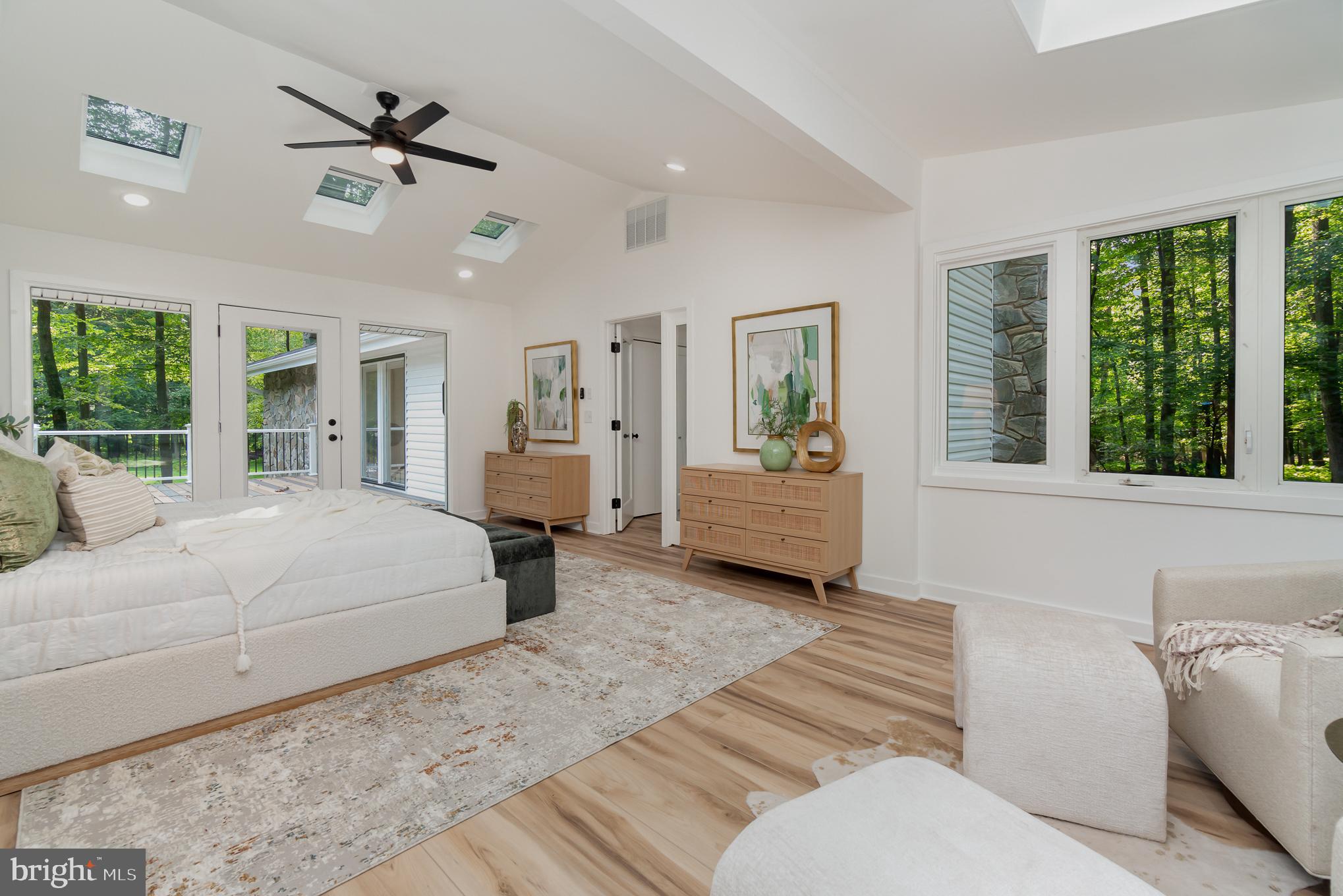 555 Hilltop Road Hummelstown, PA 17036 - Photo 38 of 56 a spacious bedroom with a large bed and a window