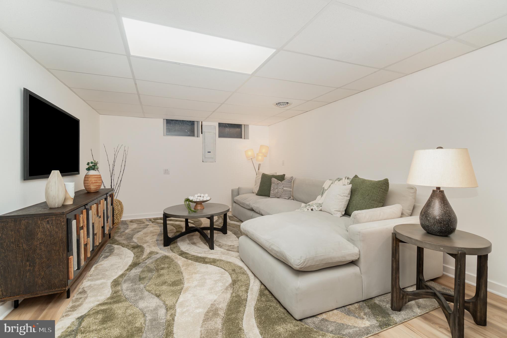 555 Hilltop Road Hummelstown, PA 17036 - Photo 46 of 56 a bedroom with furniture and a flat screen tv