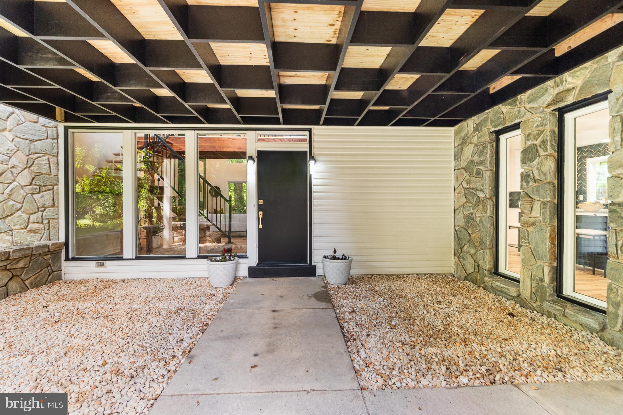 555 Hilltop Road Hummelstown, PA 17036 - Photo 50 of 56 a view of a big room with wooden floor and windows
