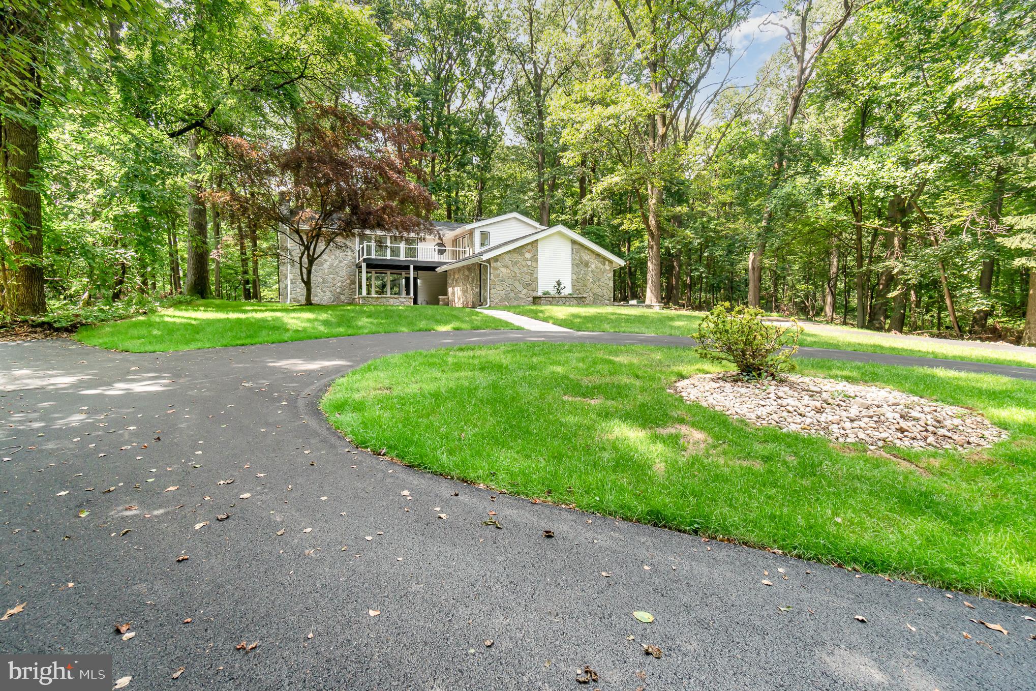 555 Hilltop Road Hummelstown, PA 17036 - Photo 54 of 56 a view of a house with a yard