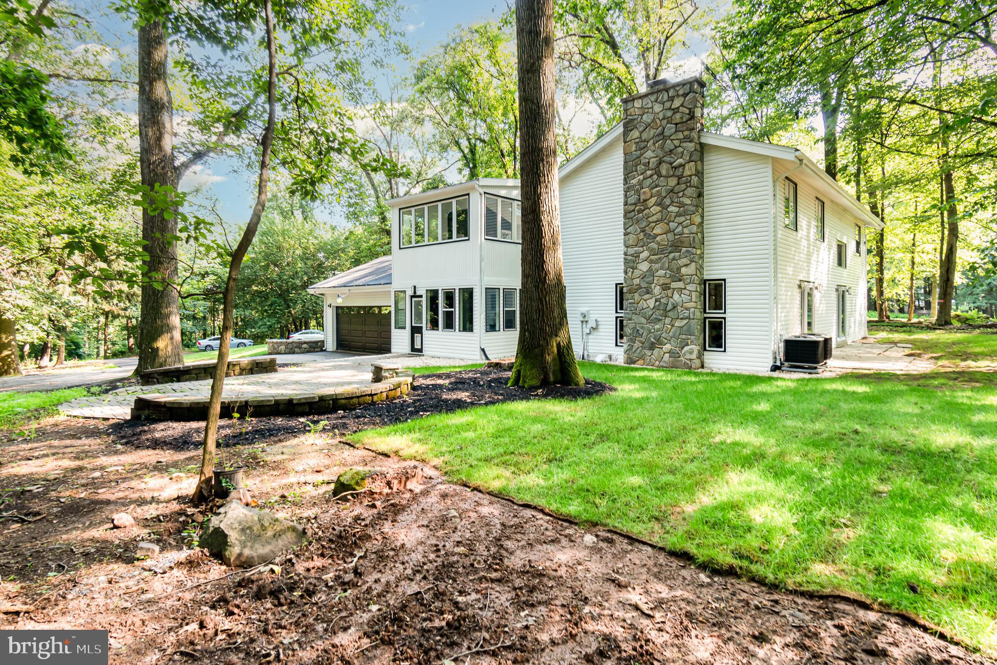 555 Hilltop Road Hummelstown, PA 17036 - Photo 8 of 56 a view of a house with backyard and sitting area