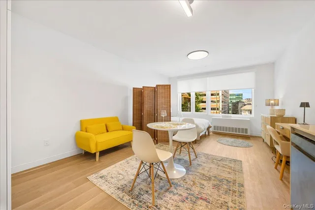 a living room with a couch and a table