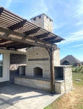 5201 Ruger Lane McKinney, TX 75071 - Photo 6 of 40 Clsoe up of Outdoor Patio Stone Fireplace
