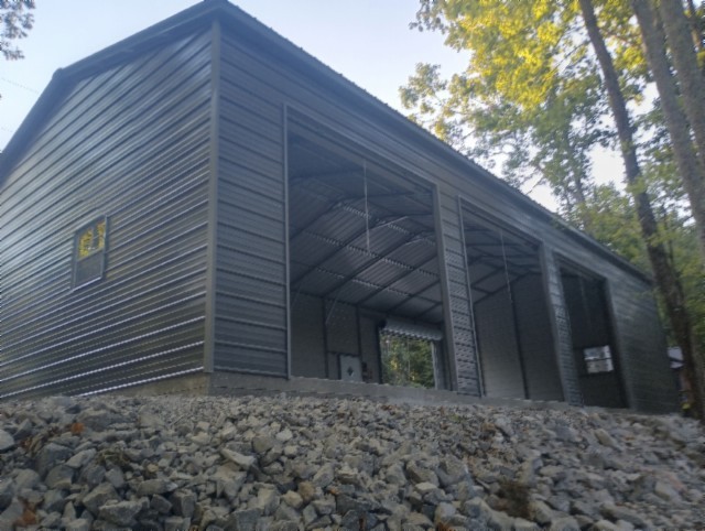 837 Rock Springs Road Celina, TN 38551 - Photo 2 of 28 a backyard of a house with lots of green space