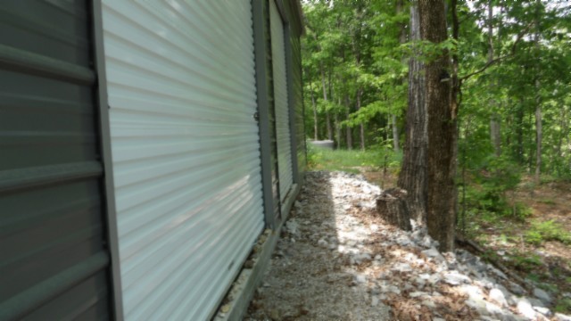 837 Rock Springs Road Celina, TN 38551 - Photo 6 of 28 a view of a yard with large trees