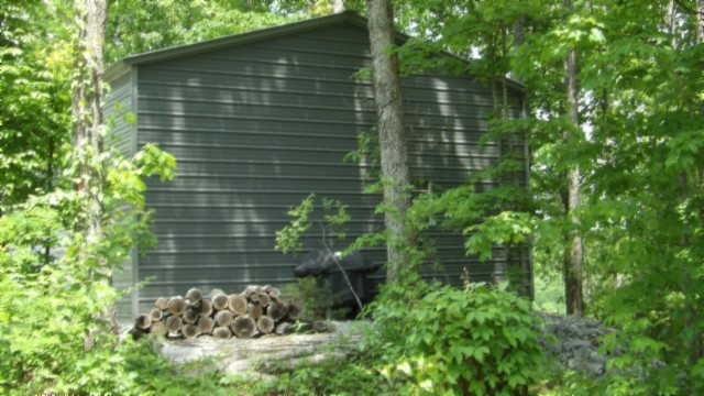 837 Rock Springs Road Celina, TN 38551 - Photo 10 of 28 a backyard of a house with lots of green space