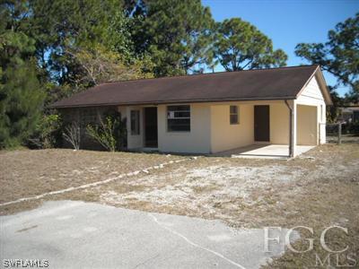 18549 Sunflower Road Fort Myers, FL 33967 - Photo 1 of 5 a house with a outdoor space