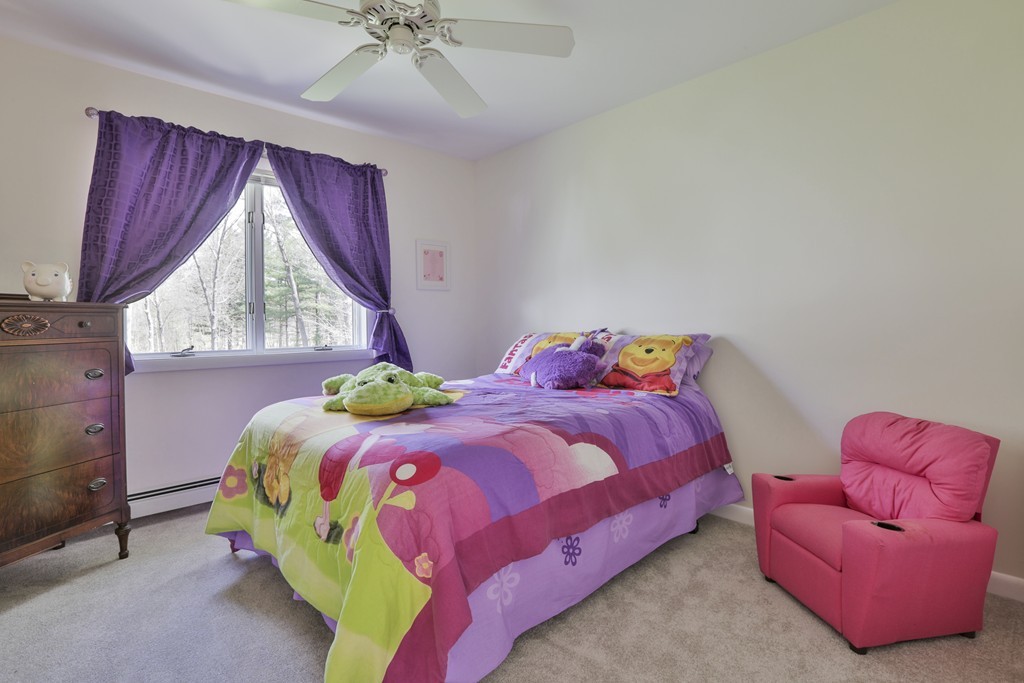 93 Beach Road Salisbury, MA 01952 - Photo 26 of 30 a bedroom with a bed and a couch