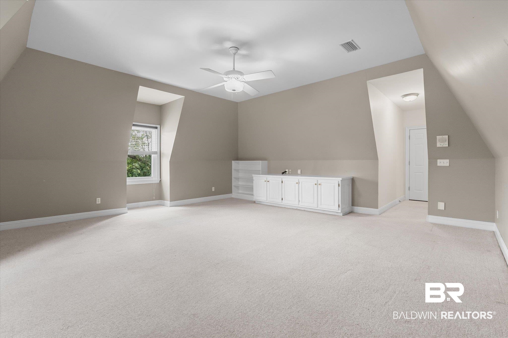 5231 Dawes Road Grand Bay, AL 36541 - Photo 27 of 49 Bonus room with light carpet, vaulted ceiling, and ceiling fan