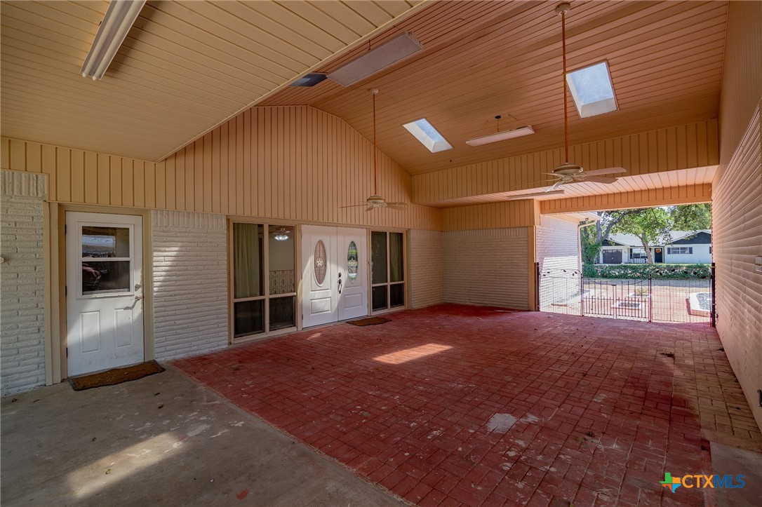 608 Berwick Road Victoria, TX 77904 - Photo 17 of 31 a view of empty room with window and ceiling fan