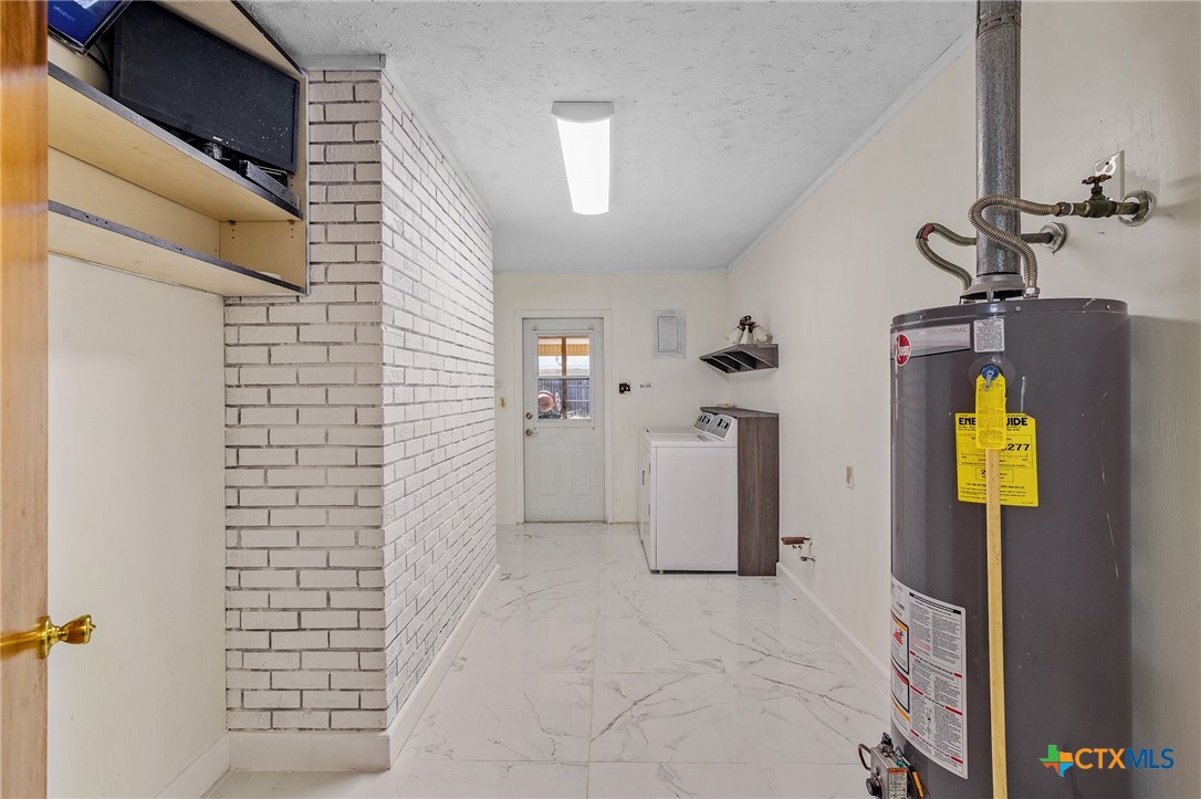 608 Berwick Road Victoria, TX 77904 - Photo 18 of 31 a view of a storage & utility room with utility room