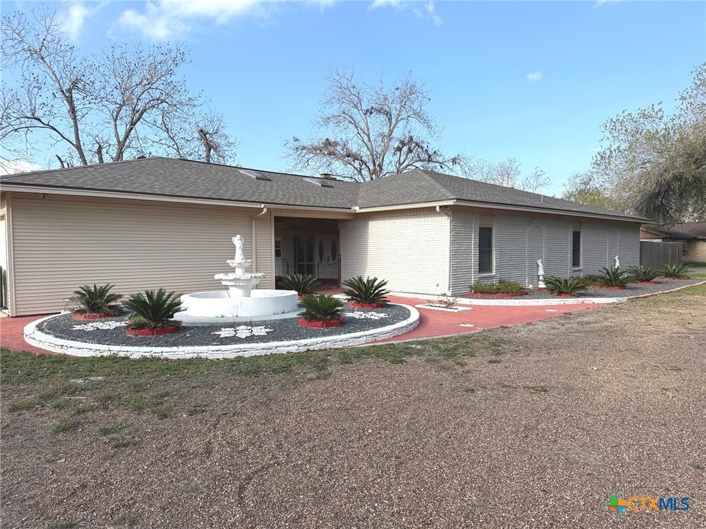 608 Berwick Road Victoria, TX 77904 - Photo 31 of 31 a front view of a house with a yard garage and outdoor seating